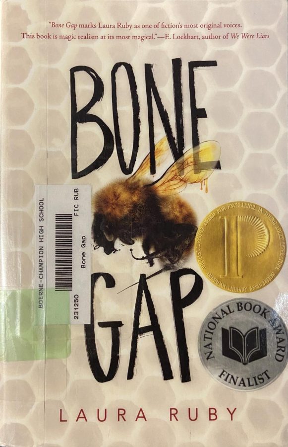 The cover of Bone Gap. This edition is available from the Champion library.