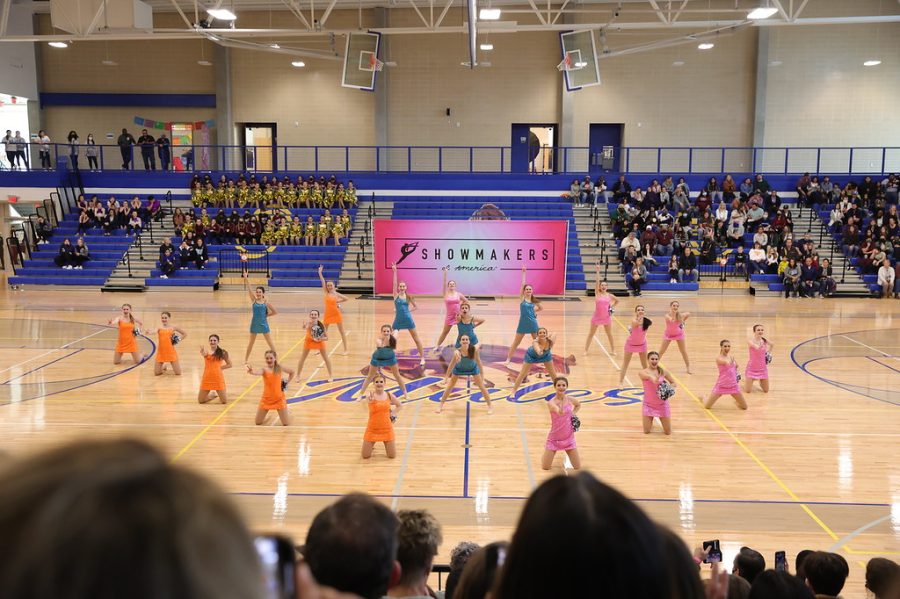 During the State Competition on March 6th, the varisty and drill team competes their pom routine at the host site, Alamo Heights High School. (Varsity)