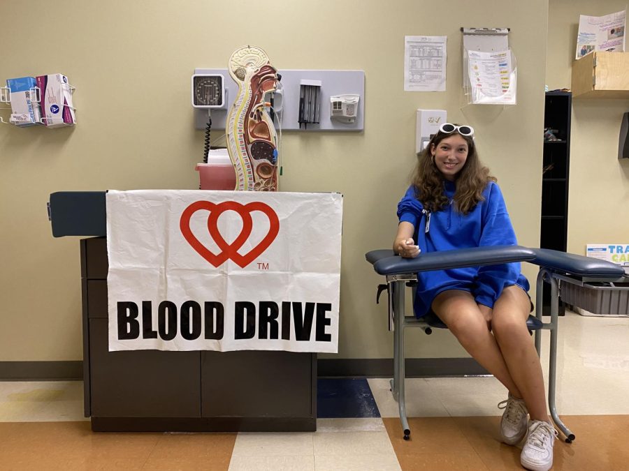 Sophomore Rebekah Jackson poses with blood-drawing equipment in the health classroom. The health students are the ones organizing the drive, which will bring blood to regional hospitals for transfusions.