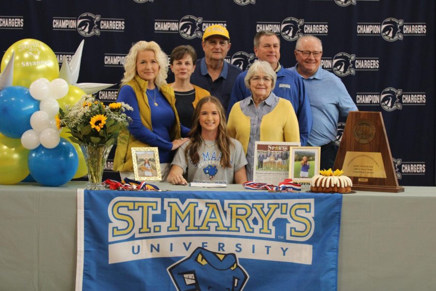 Savannah Dupre signs with St. Marys University to follow in her fathers footsteps to play golf.