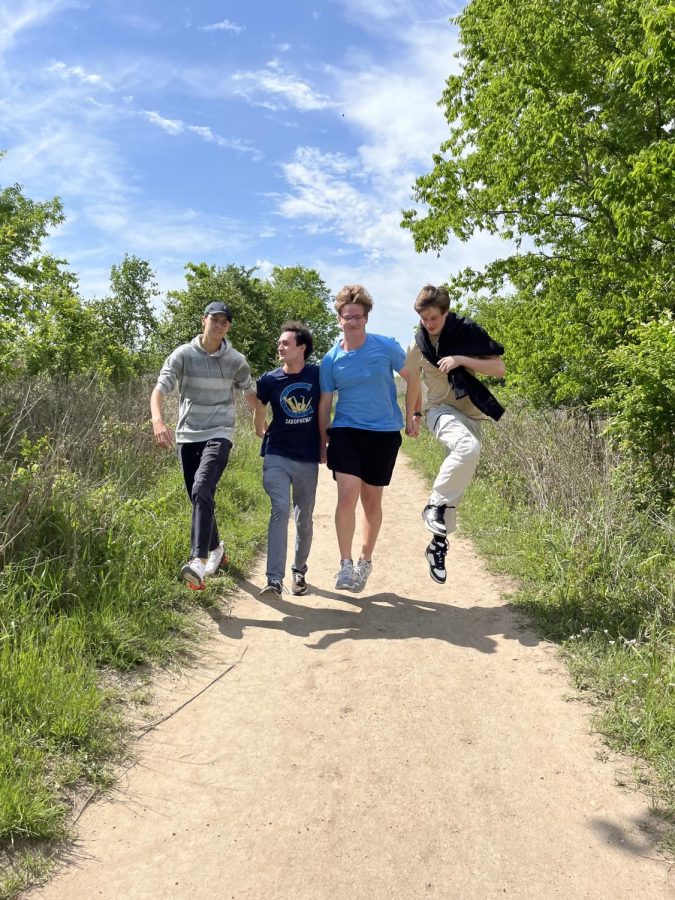 Seniors Quinn Gummel, Ethan Ratliff, Conrad Mcmann, and on the prairie path Monday at the Cibolo Center for Conservation.