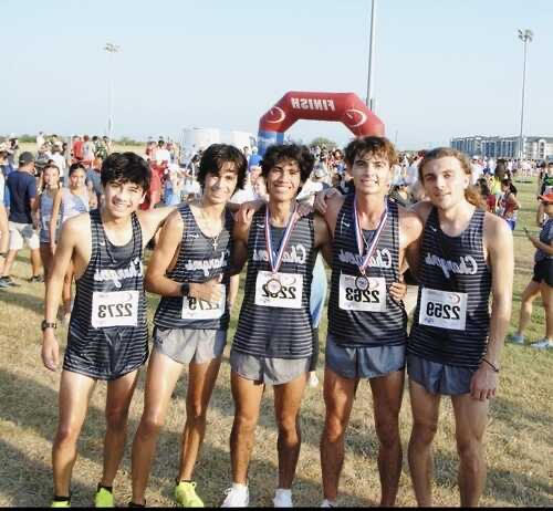 Varsity Cross Country Runners Brandon Martinez, Mason Nelson, Luis Tovar, Shawn Edwards, and William Coover celebrate the win.